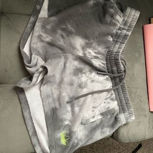 Adidas shorts with lime green adidas sign